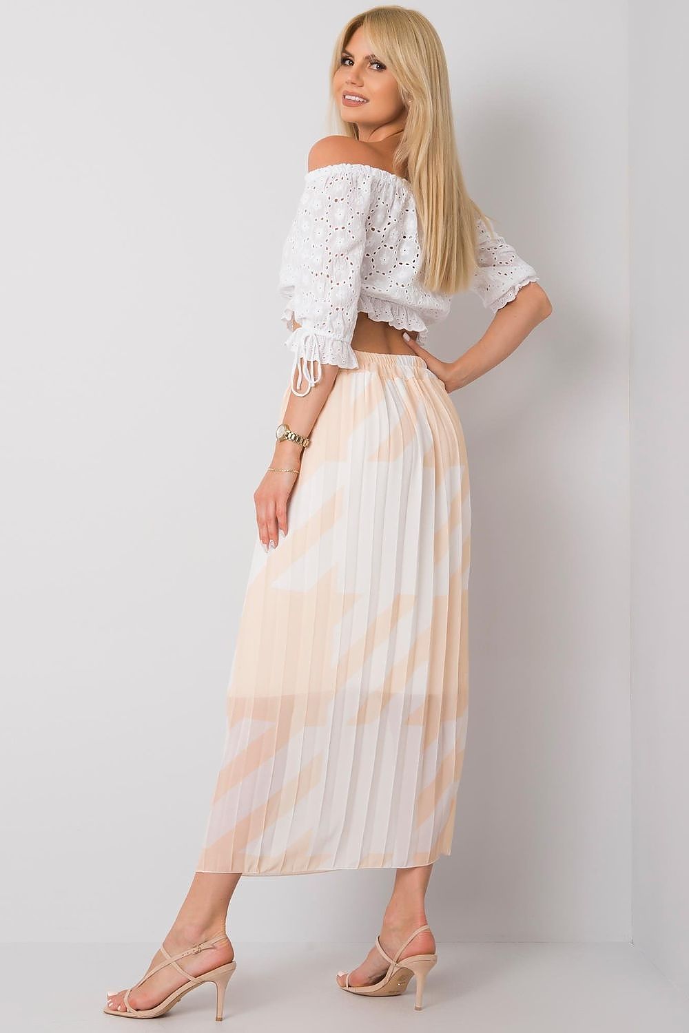 Italy Moda pleated skirt with elastic waistband viewed from the back, illustrating the sophisticated silhouette perfect for summer elegance in size EU 0.