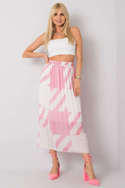 Italy Moda pleated skirt with elastic waistband presented in a pink pattern, exuding chic summer fashion appeal paired with a sleek white crop top in size EU 0.