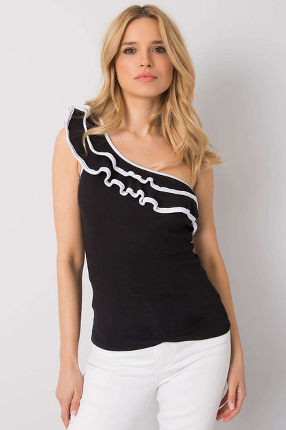 Elegant model wearing the Och Bella Asymmetrical Neckline Top with Decorative Frill, showcasing a luxurious cotton blend fabric. This stylish black top features a unique asymmetrical design and feminine frill details, perfect for any chic occasion.