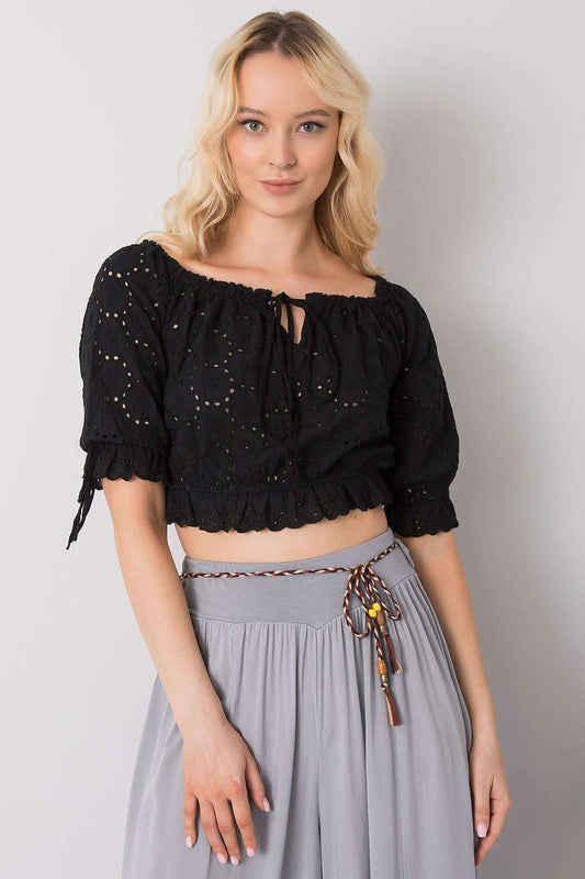 Och Bella Women's Short Sleeve Cotton Blouse with Openwork Pattern and Front Tie showcased on a model, featuring a stylish design with delicate openwork, perfect for a chic summer outfit.