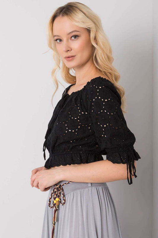 Och Bella Women's Short Sleeve Cotton Blouse with Openwork Pattern and Front Tie, elegantly styled, showcasing intricate openwork fabric and front tie detail.