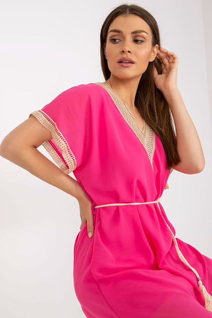 Experience effortless elegance in the Italy Moda Loose-Fitting Daydress, featuring a heart neckline and exquisite openwork detailing in striking pink, perfect for summer celebrations.