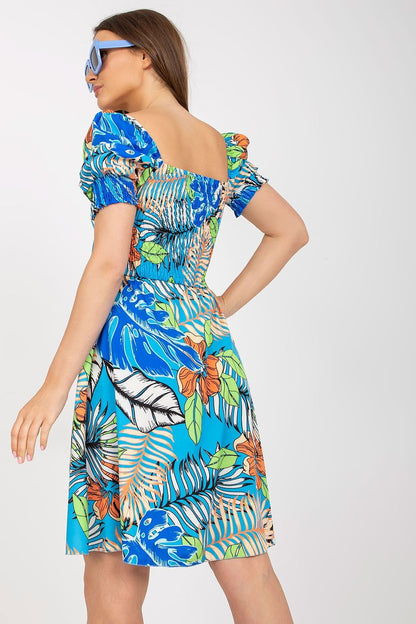 Elegant Summer Dress by Italy Moda featuring a vibrant floral print, structured puff sleeves, and a stylish back view, ideal for summer occasions.