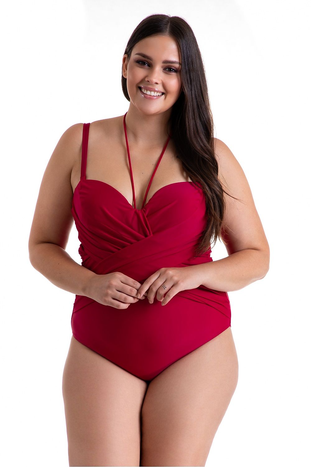 Luxury One-Piece Women's Swimsuit by Barontex featuring adjustable straps, optical slimming design, and stylish pleated detailing, modeled in a vibrant red on a confident woman.