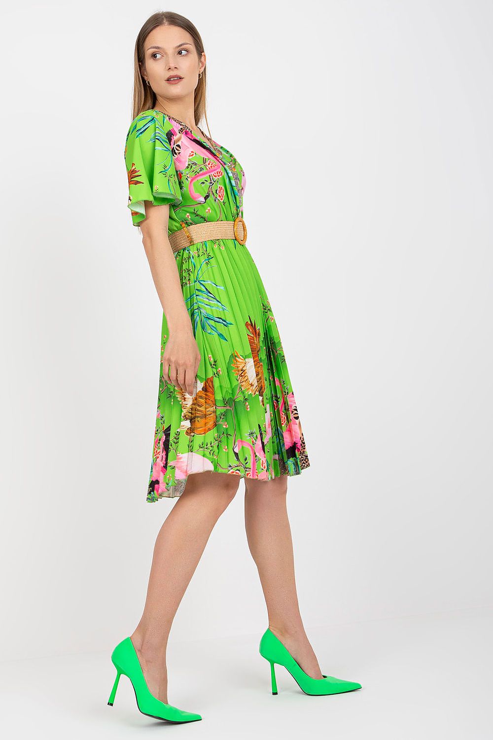 Elegant Summer Dress with Short Sleeves, Envelope Neckline and Braided Belt by Italy Moda, featuring a vibrant green floral print and styled with chic green high heels.