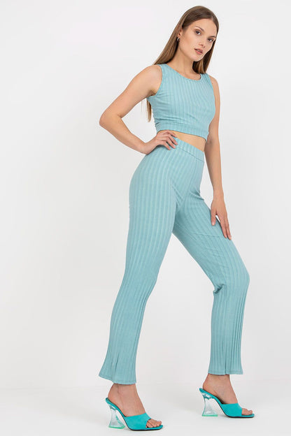 Italy Moda 2-Piece Ribbed Cotton Set - Short Top & High-Waist Long Pants, with a model exuding sophistication in a fitted teal set, paired with contemporary clear-heeled sandals.