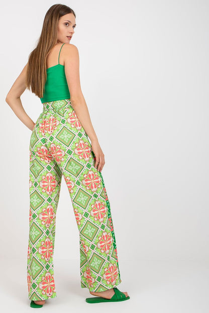 Italy Moda Women's High-Waisted Wide-Leg Trousers with Elastic Waistband - Elegant Comfort Pants, displayed from behind, highlighting the exquisite floral design and tailored fit, ideal for an upscale casual ensemble.