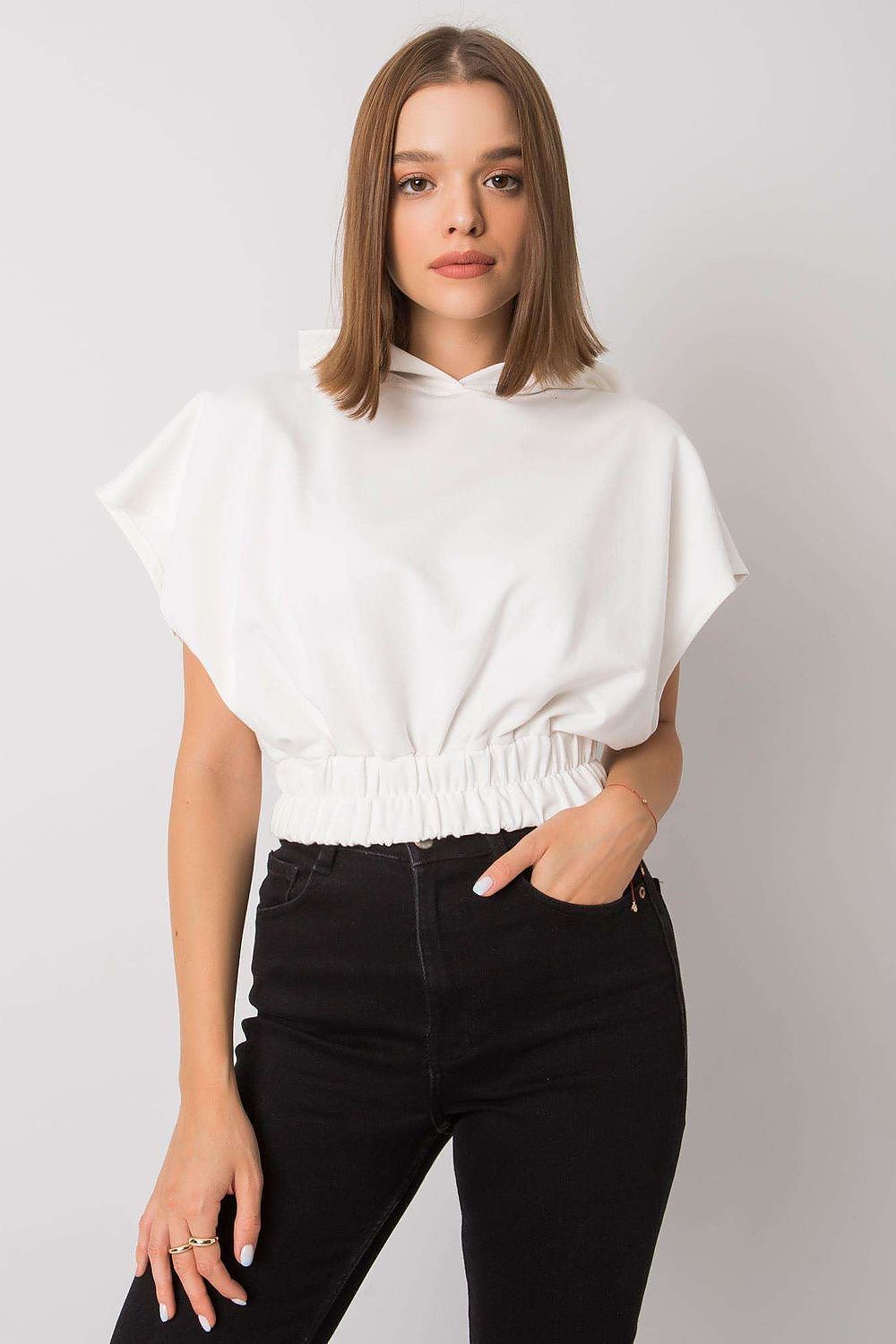 Ladies' Loose-Fit Sweatshirt with Short Sleeves and Hood, 65% Cotton Blend, elegantly styled on a model showcasing a chic casual look.