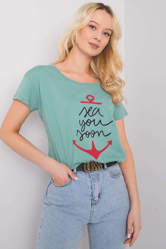 Fancy Ladies' Short Sleeve Cotton T-Shirt with Decorative Print - Round Neck Style, showcasing a fashionable sea-inspired motif on a tranquil green background, ideal for relaxed sophistication.