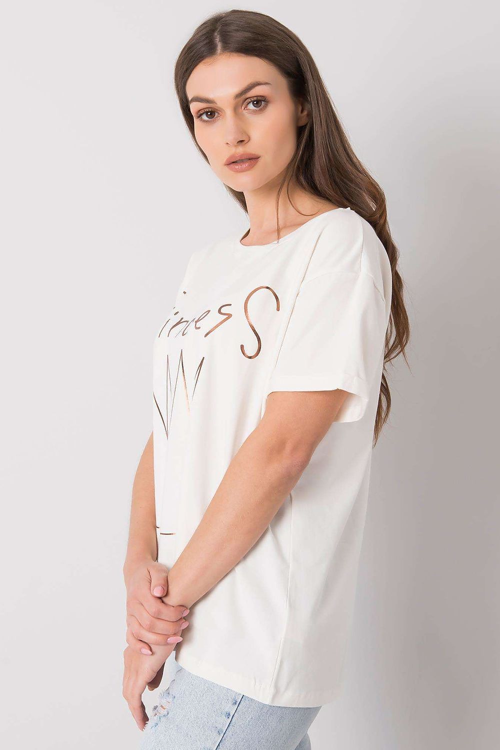 Elegant Ladies' Short Sleeve T-Shirt with Decorative Print styled from a side angle, highlighting the luxurious white fabric and trendy 'Princess' design.