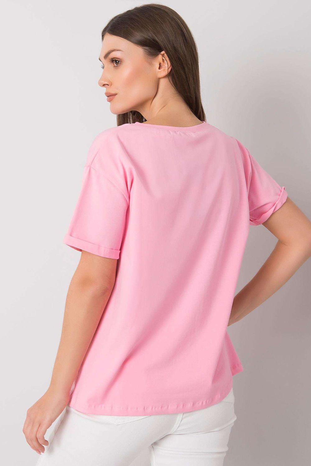 Elegant Ladies' Short Sleeve T-Shirt with Decorative Print, highlighting the back view of a model in a pink shirt with rolled sleeves, perfect for a stylish casual look.
