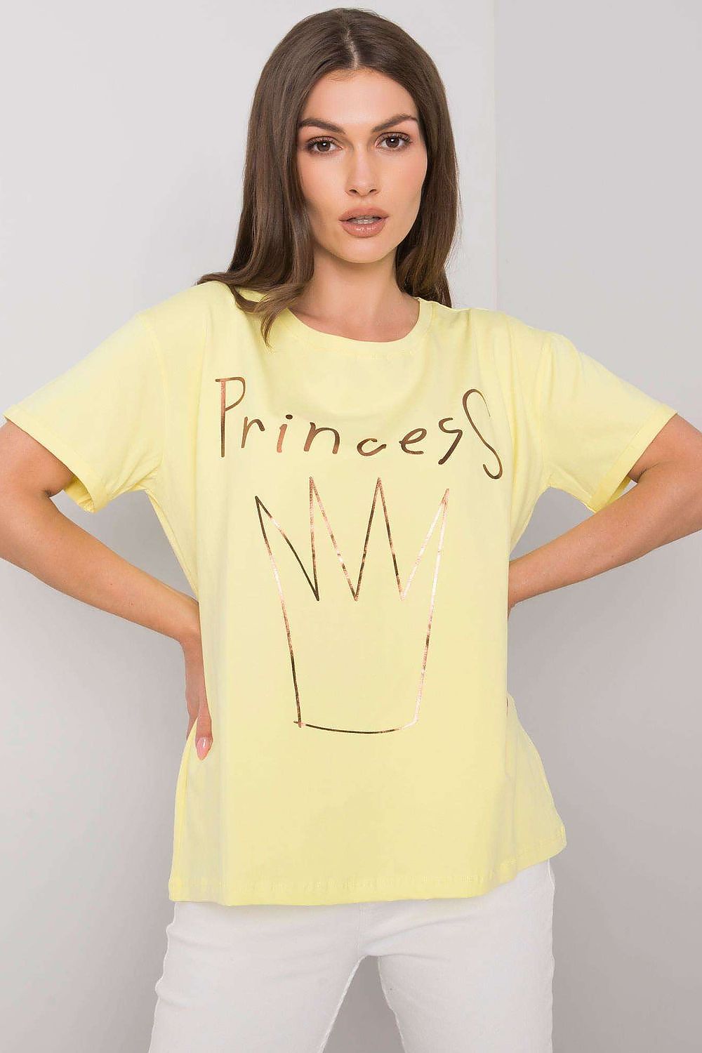 Elegant Ladies' Short Sleeve T-Shirt with Decorative Print in sunny yellow, featuring a chic 'Princess' print, expertly made from 95% Cotton and 5% Lycra, model showcases it with casual white trousers.