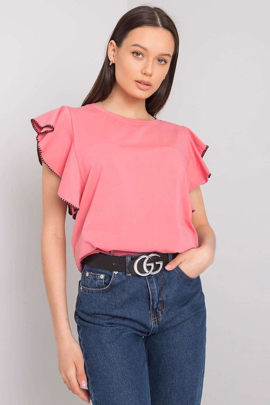 Elegant Frill Sleeve Cotton Blend Blouse with Round Neck – Versatile Everyday Wear, model showcasing a pink frill sleeve blouse paired with high-waisted denim.