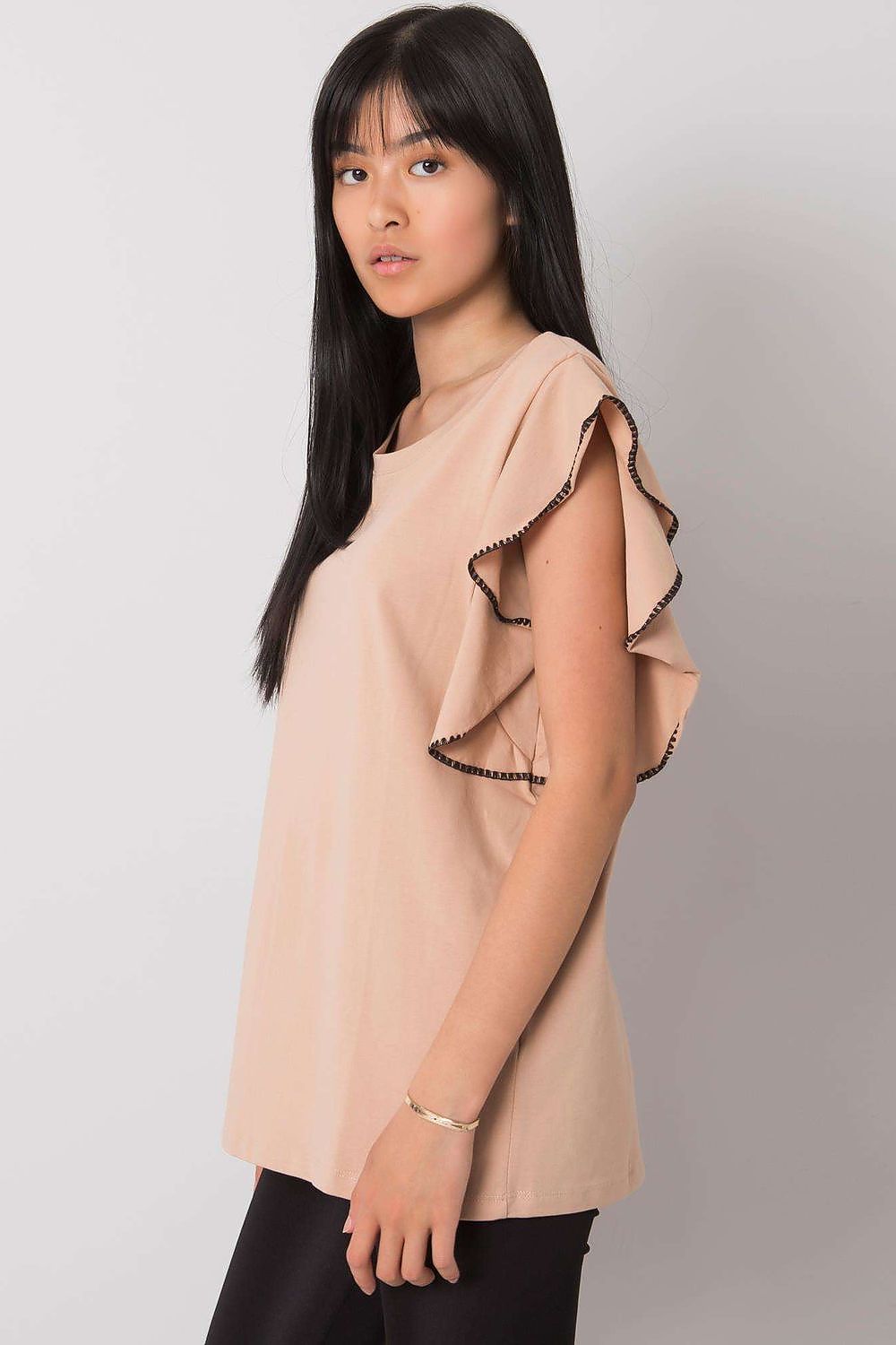 Elegant Frill Sleeve Cotton Blend Blouse with Round Neck showcased on a model, highlighting the soft peach fabric and delicate frill sleeve design, perfect for versatile everyday wear.
