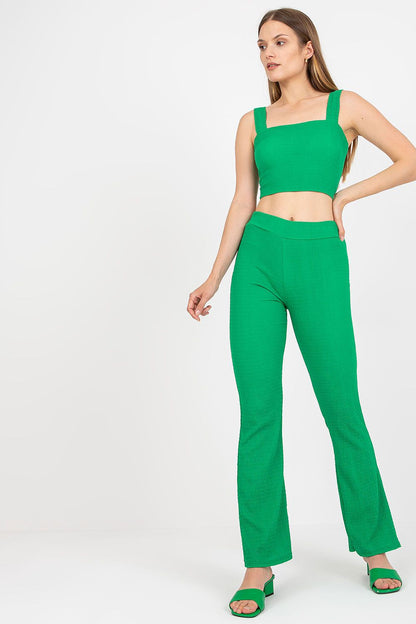 Italy Moda Women's Elegant Two-Piece Set displayed in a luxurious green shade, consisting of a cropped top and long flare pants, effortlessly styled for an elegant look.