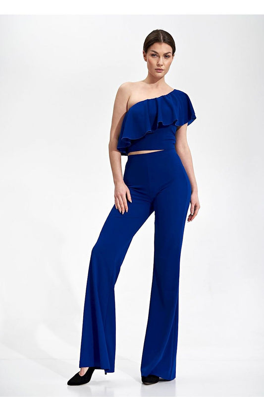 A model showcasing Figl Women's Stretchy Bell-Bottom Trousers with Wide Rubber Band Waist in vibrant blue, paired with an elegant one-shouldered ruffled top, embodying a fashion-forward fit.