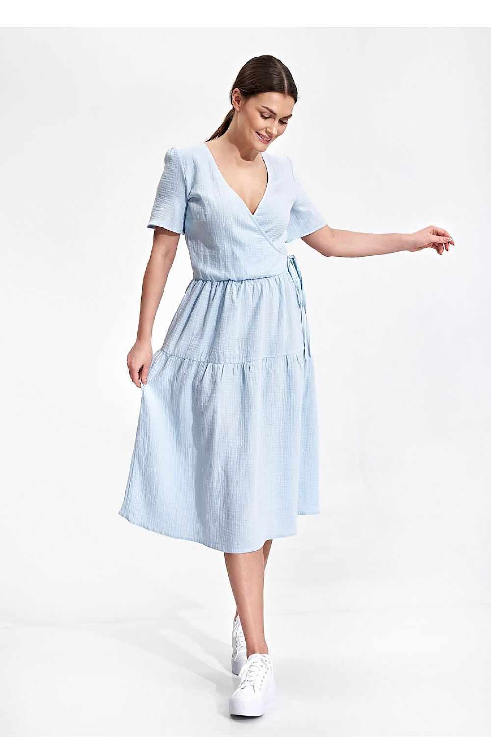 Elegant Figl Summer Midi Dress with Short Sleeves and Flared Cut in 100% Cotton, styled elegantly on a model in a light blue dress, capturing the movement and beauty of the garment.