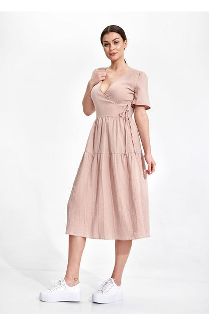 Elegant Figl Summer Midi Dress with Short Sleeves and Flared Cut in 100% Cotton, showcased in a sophisticated pose. Its envelope neckline enhances a refined aesthetic.