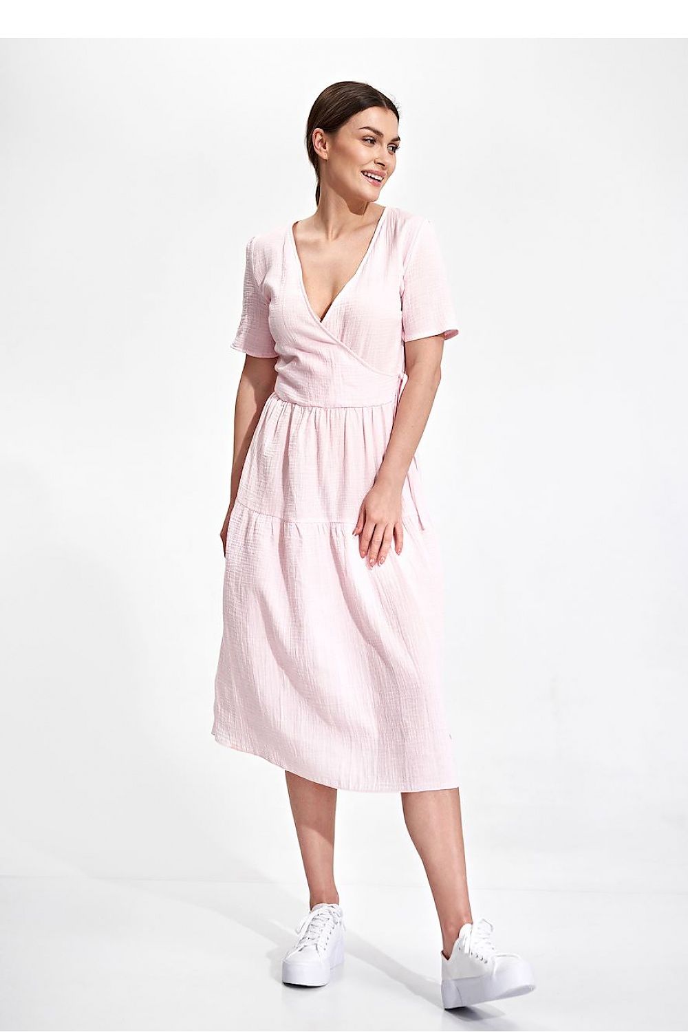 Elegant Figl Summer Midi Dress with Short Sleeves and Flared Cut in 100% Cotton, presented with a joyful expression, showcasing the dress's flattering fit and refined style.