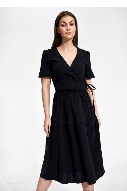 Model showcasing the Elegant Figl Summer Midi Dress with Short Sleeves and Flared Cut in 100% Cotton in a sophisticated black shade, reflecting modern elegance.