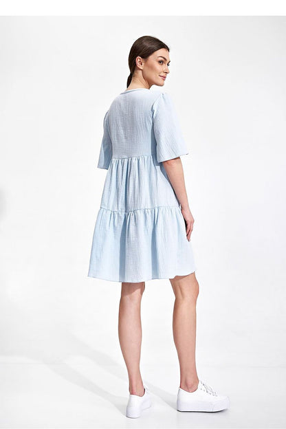 Elegant Summer Flared Mini Dress with Ruffles and Short Sleeves by Figl - Back view of a light blue flared mini dress with ruffles, ideal for a sophisticated summer look.