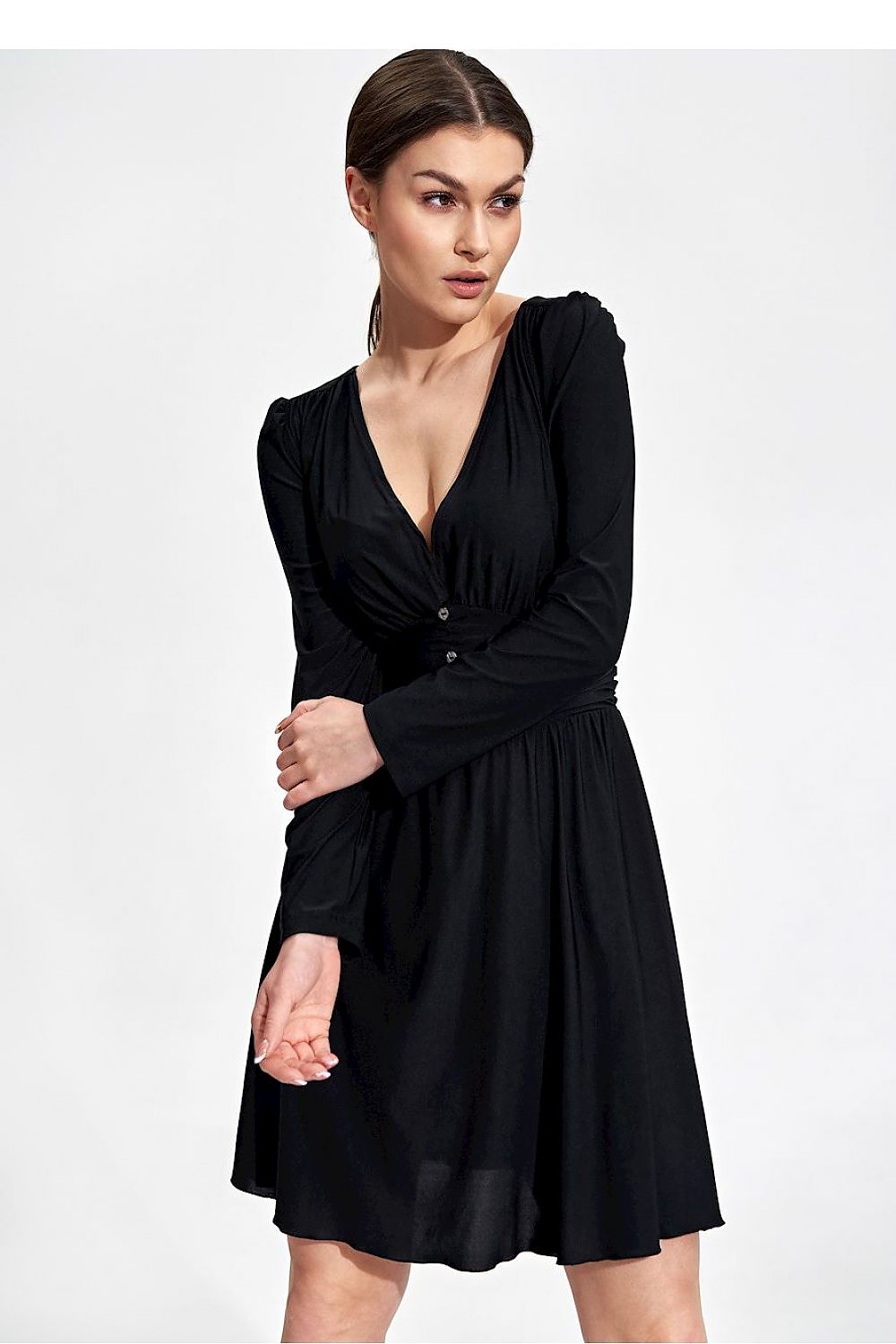 Elegant Flared Knee-Length Dress by Figl in black, model posing with an elegant expression, highlighting the long sleeves and sweetheart neckline.