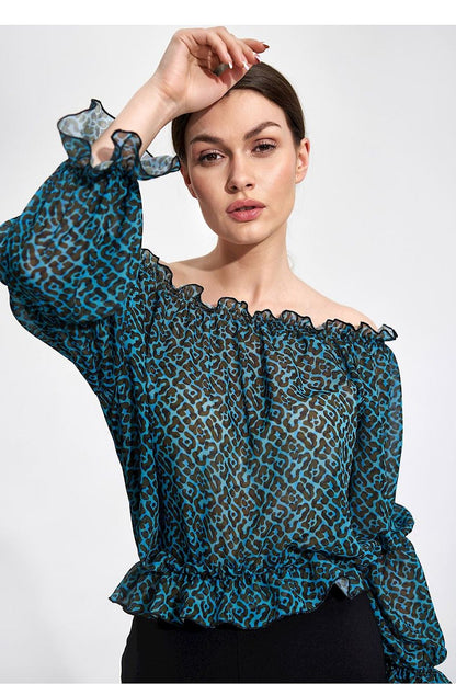 Elegantly Airy Figl Long Sleeve Blouse with Elastic Bands - Close-up of a model displaying the intricate floral design of the off-shoulder blouse, showcasing its exquisite detailing.