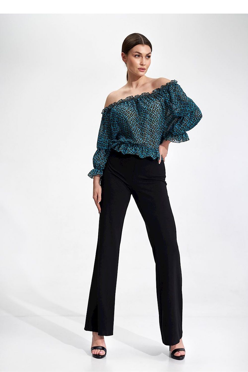 Chic and sophisticated Figl long sleeve blouse showcased with a bold blue and black design, designed with elastic bands for a flattering fit, ideal for upscale occasions.