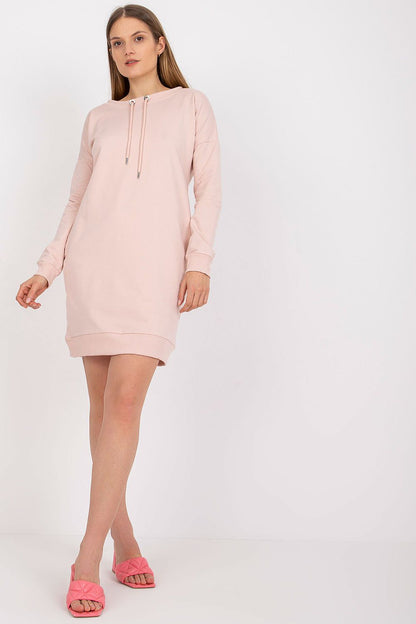 Chic Women's Long-Sleeved Tracksuit Dress with Pockets and Tie-Up Neckline by BFG, presented in a sophisticated soft pink, highlighting its contemporary silhouette and fashionable design.