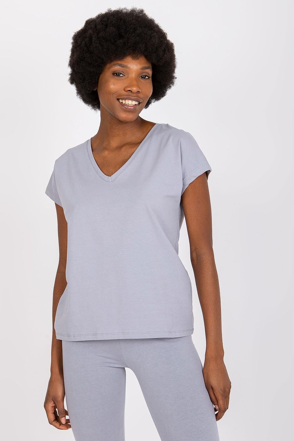 Chic model in a grey Luxury BFG Heart Neckline T-Shirt, exuding a sophisticated vibe with a minimalist look.