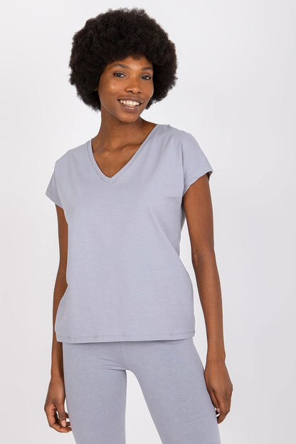 Chic model in a grey Luxury BFG Heart Neckline T-Shirt, exuding a sophisticated vibe with a minimalist look.