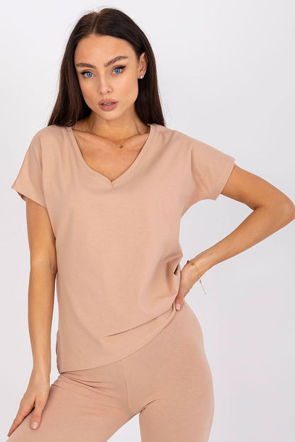 Luxury BFG Heart Neckline T-Shirt in soft beige, elegantly styled on a model showcasing a sophisticated look.