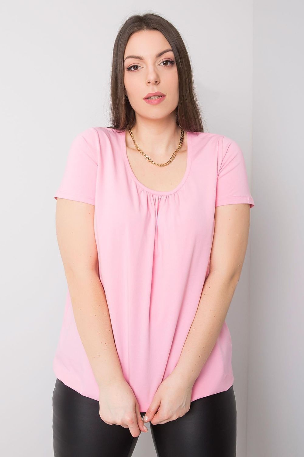 BFG Women's Plus Size T-Shirt in soft pink, made from a luxurious cotton blend, featuring short sleeves and a round neckline, elegantly styled for everyday comfort and sophistication.