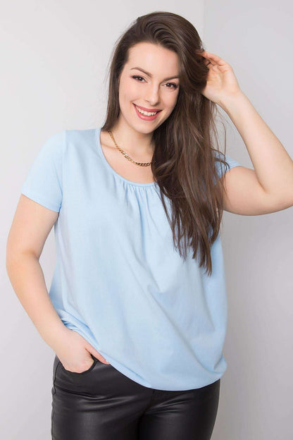 Stylish BFG Women's Plus Size T-Shirt in exquisite light blue cotton blend, featuring short sleeves and a round neckline, paired effortlessly with sleek black leather pants, the epitome of luxury comfort. Sizes 2XL to 4XL.