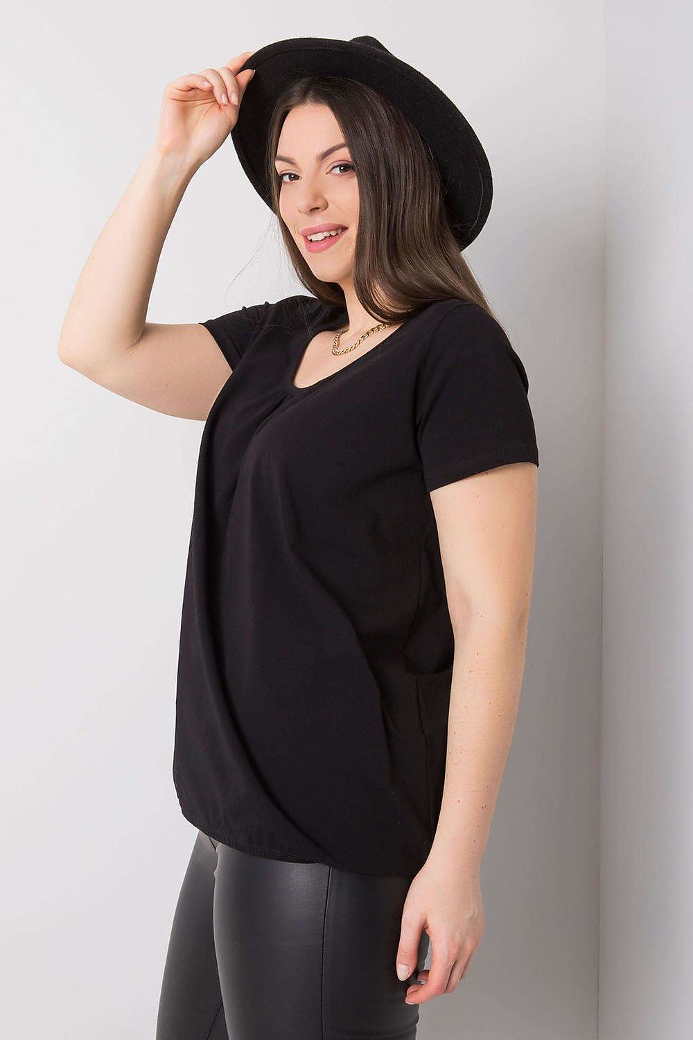 Sophisticated BFG Women's Plus Size T-Shirt displayed in black, showcasing its flattering short sleeves and round neckline, ideal for luxurious casual styling. Available in sizes 2XL to 4XL.