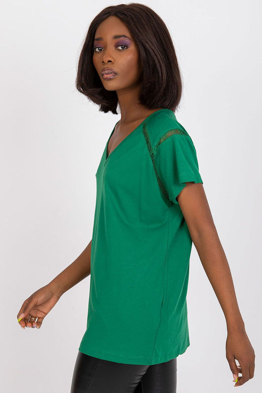 Elegant Short Sleeve Blouse with Heart Neckline showcased in vibrant green, model exuding sophistication with a stylish side pose, highlighting its soft fabric and breezy fit, perfect for any occasion.