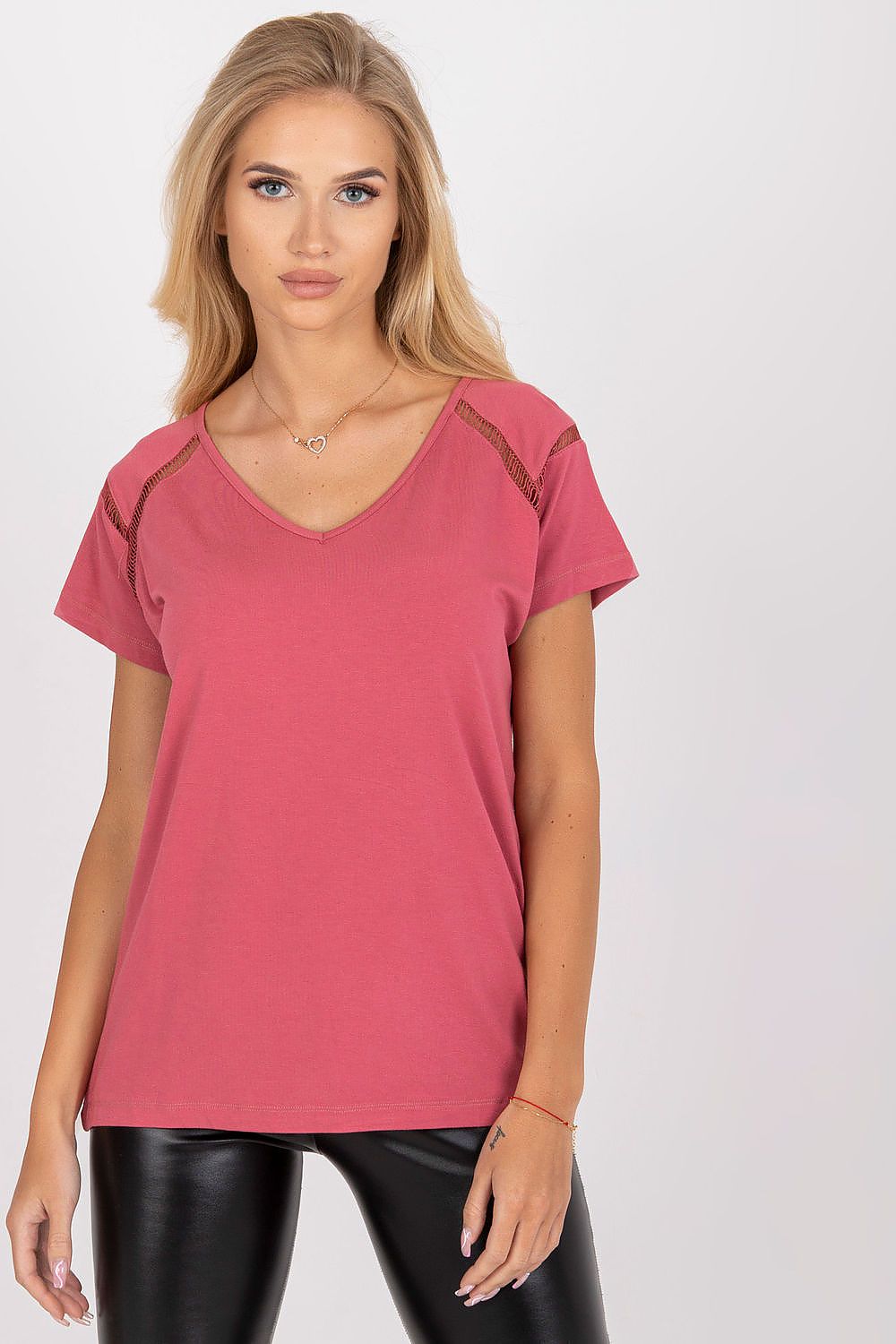 Elegant Short Sleeve Blouse with Heart Neckline modelled by a woman, showcasing the luxurious design made of 95% viscose, perfect for any occasion.