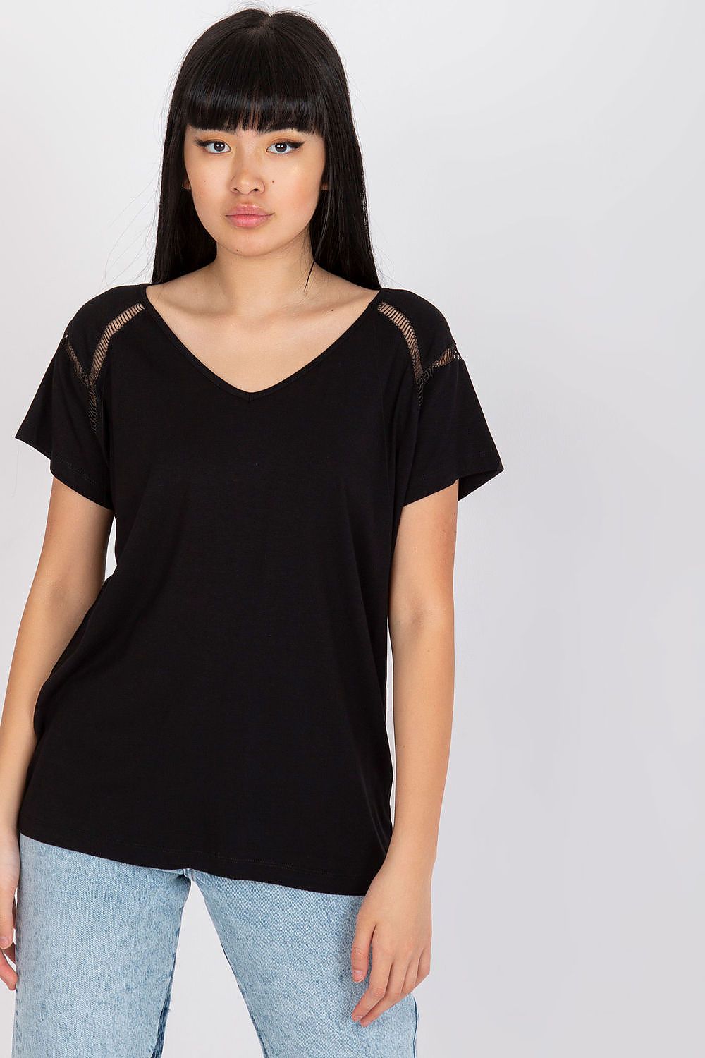 Elegant Short Sleeve Blouse with Heart Neckline modelled by a woman in black, displaying a chic look that combines elegance and comfort for any occasion.