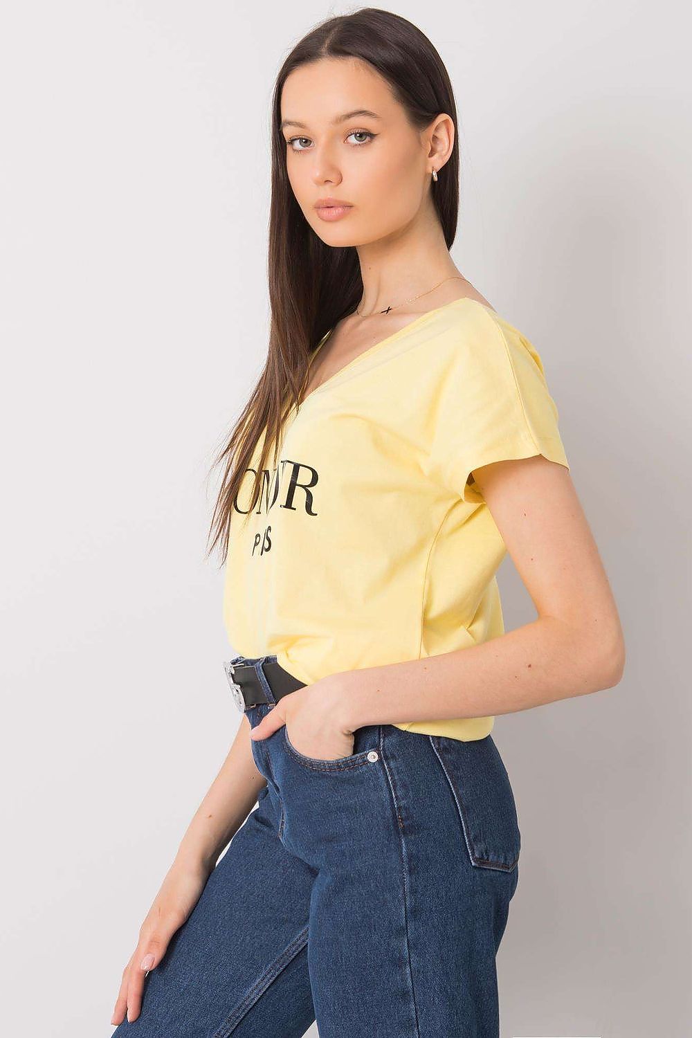 Luxury Cotton T-Shirt with Heart-Shaped Neckline and Decorative Inscription, in an eye-catching yellow, elegantly displayed on a model, highlighting the fashionable 'BONJOUR PARIS' lettering with stylish high-waisted trousers.