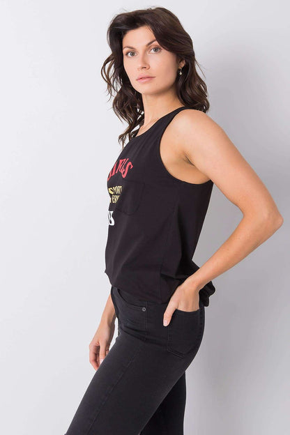 Side view of a model in the Luxury Sleeveless Extended Cut T-Shirt with Decorative Inscription, highlighting the stylish black tank top and its comfortable fit.