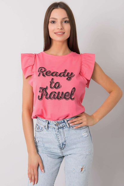Elegant Short Sleeve Frill Blouse with Decorative Inscription - Cotton and Lycra Blend, featuring a model wearing the coral blouse adorned with 'Ready to Travel' text, styled elegantly with distressed high-waisted jeans.