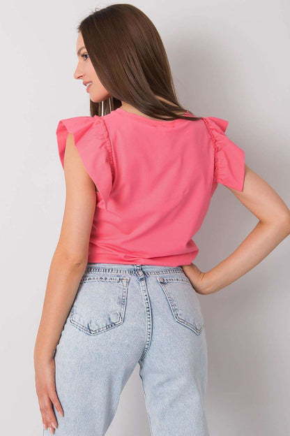 Elegant Short Sleeve Frill Blouse with Decorative Inscription - Cotton and Lycra Blend. Model showcasing the blouse from the back, highlighting the frill sleeves in a soft pink shade.