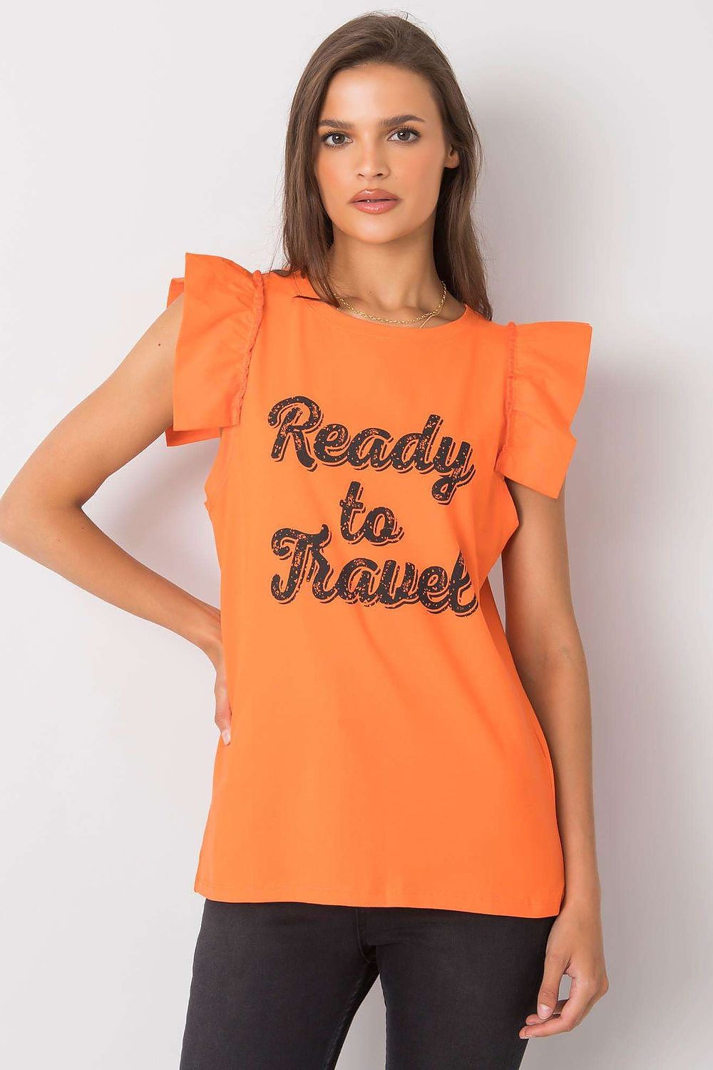 Elegant Short Sleeve Frill Blouse with Decorative Inscription - Cotton and Lycra Blend. Model in a vibrant orange version of the blouse, featuring a delightful frill design and 'Ready to Travel' print.