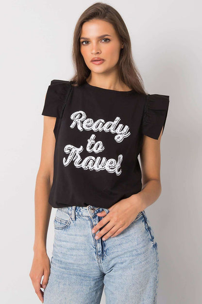 Elegant Short Sleeve Frill Blouse with Decorative Inscription - Cotton and Lycra Blend, model wearing a black blouse with frill sleeves and 'Ready to Travel' inscription, styled with denim shorts.