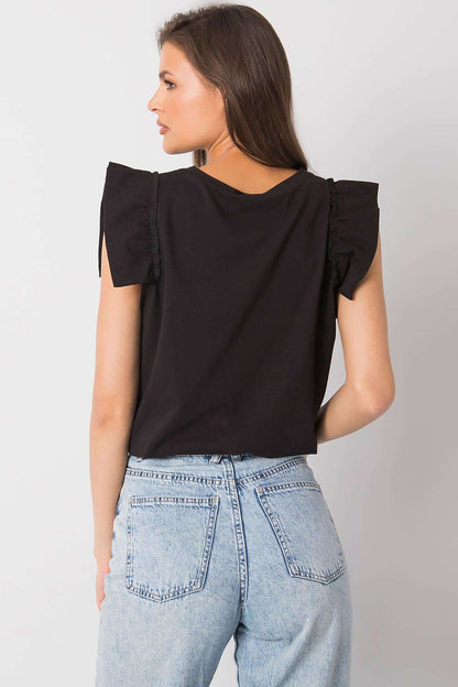 Elegant Short Sleeve Frill Blouse with Decorative Inscription - Cotton and Lycra Blend, back view of a model wearing a black frill blouse with a decorative inscription, paired with high-waisted jeans.