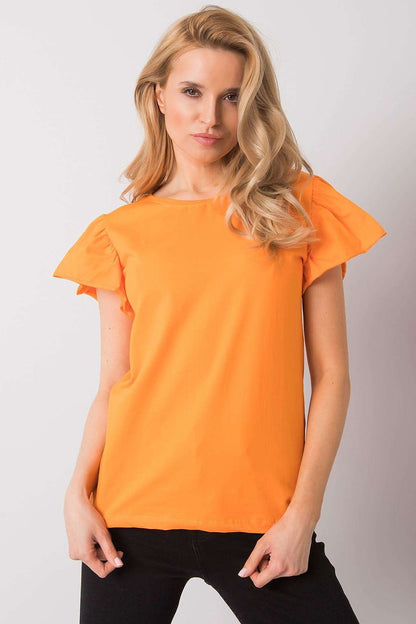 Elegant Cotton And Lycra Frill Sleeve Blouse With Round Neckline in a bold orange hue, styled elegantly with black jeans, perfect for any occasion.