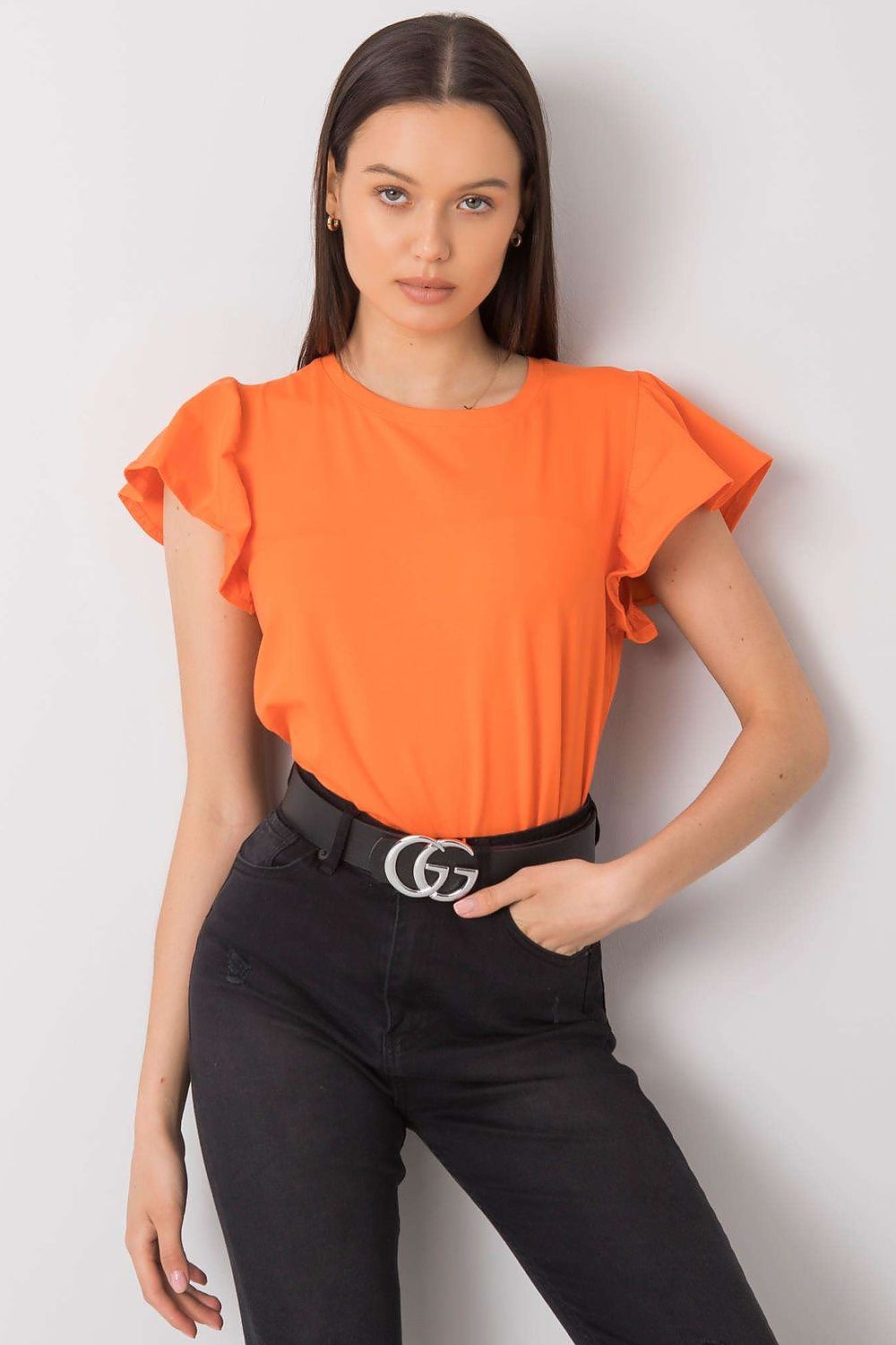 Elegant Frill Sleeve Blouse with Round Neckline in striking orange, model exudes sophistication paired with high-waisted trousers.