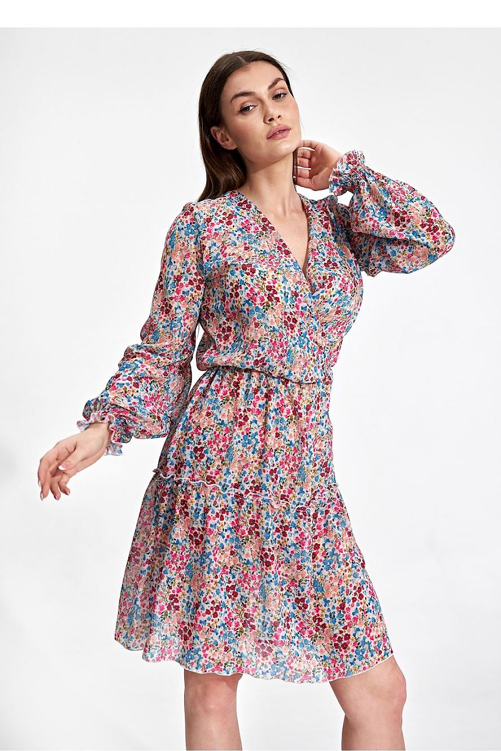 Elegant Figl Summer Mini Dress with Long Sleeves, Ruffle Hem, and Waist Detail - Model showcasing the vibrant floral print mini dress, featuring long sleeves and a stylish ruffle hem.