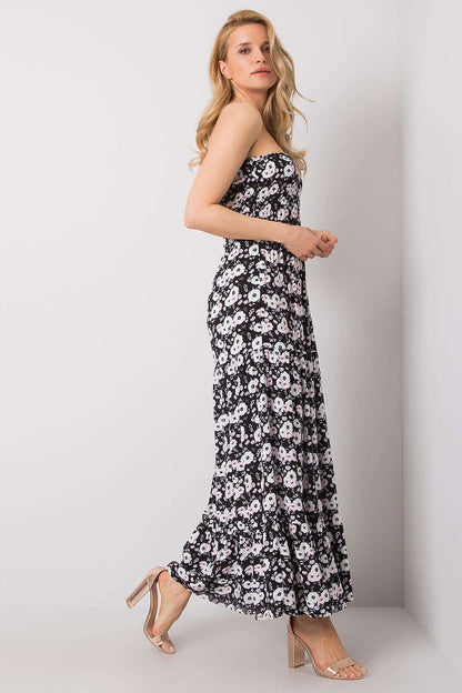Elegant strapless long summer dress with ruffle hem and floral pattern, made of 100% viscose by Fresh Made, showcased on a model against a neutral background.