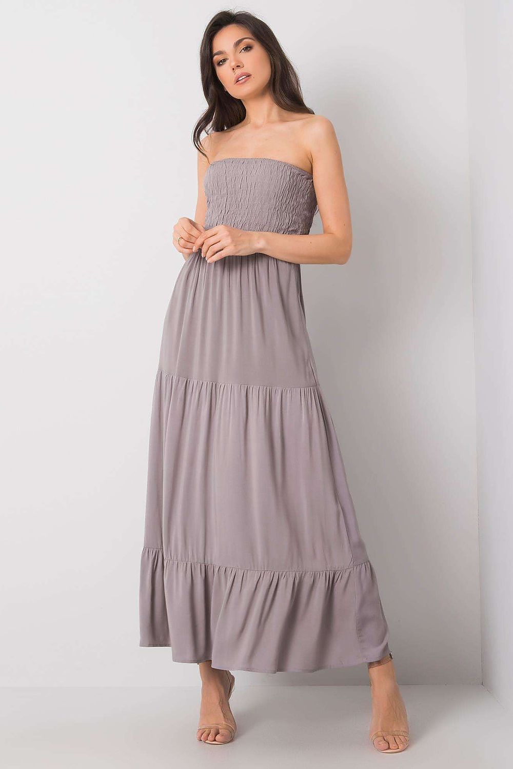 Chic strapless long summer dress in a sophisticated solid grey hue with a ruffle hem, crafted from 100% viscose, presented by Fresh Made.